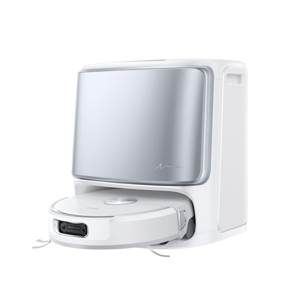 Narwal Flow robot vacuum and mop returning to the base station for charging and automatic maintenance.